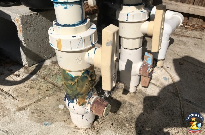 Damaged pool plumbing being assessed by Chlorine King for repair