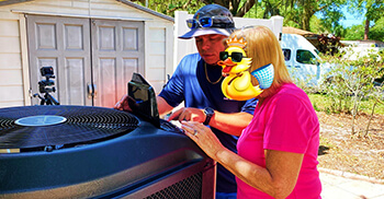 Pool tech demonstrating pool maintenance